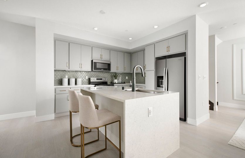 Luxurious kitchen with waterfall edge island