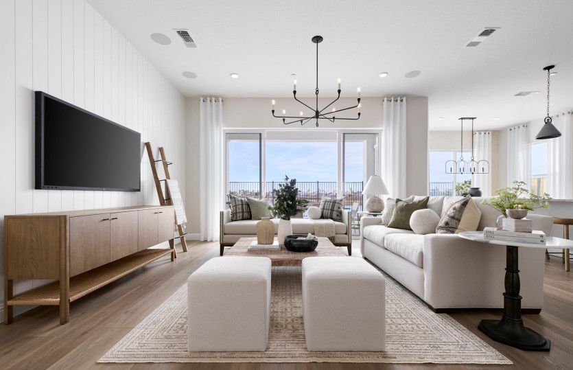 Gathering room opens to kitchen - model representation