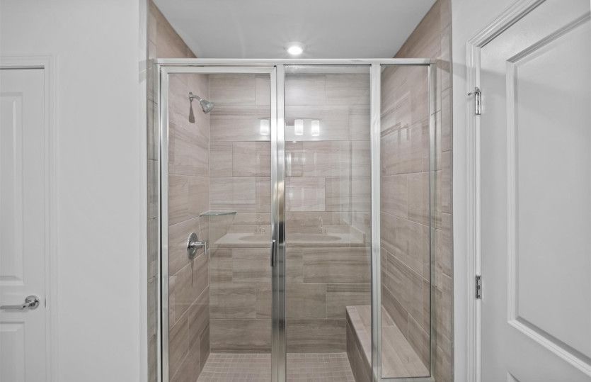 Owner's Bath with Dual Bowl Vanity and Walk-In Shower
