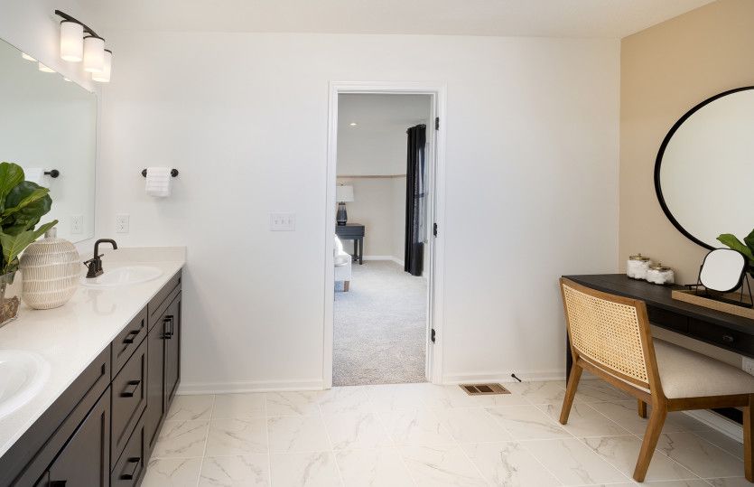 Large Owner's Bath with Two Vanities and Separate Tub/Shower