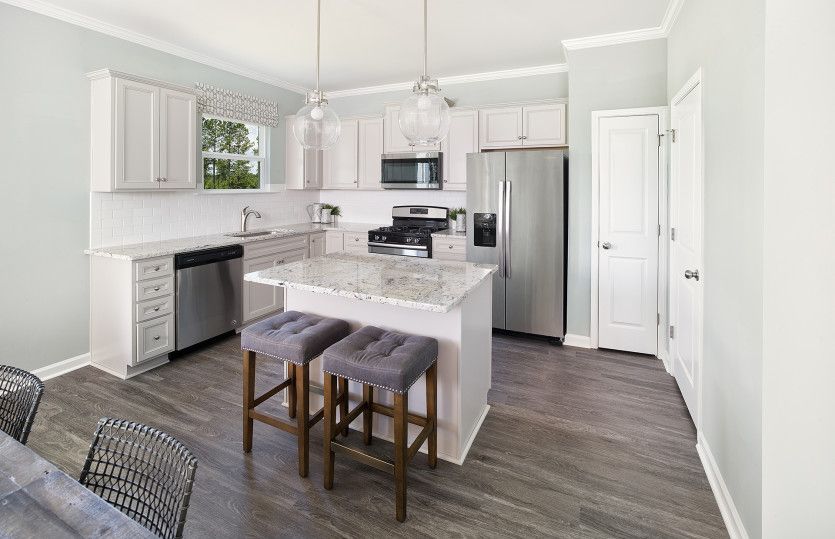 Enjoy cooking meals in the Aspire kitchen with stainless steel appliances.