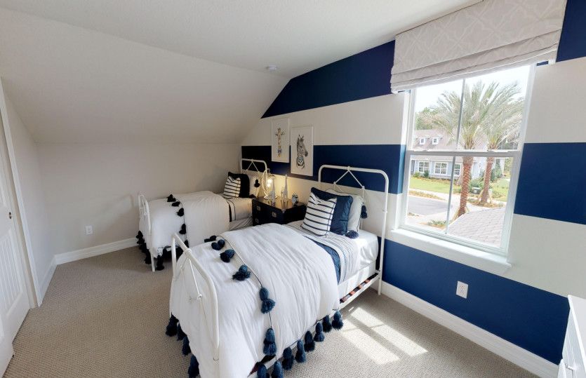 A full bedroom and bathroom upstairs offers more privacy for your guests