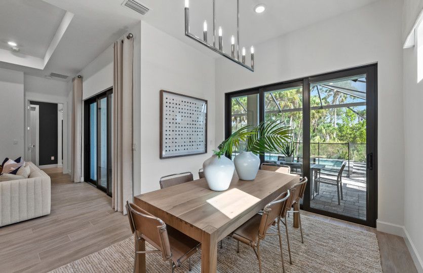 Café dining space with sliding glass door to lanai