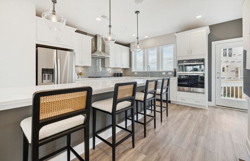 Kitchen with Expansive Island and Stainless Steel Appliances