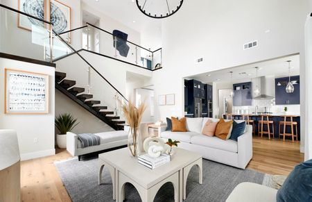 Gathering room with floating staircase