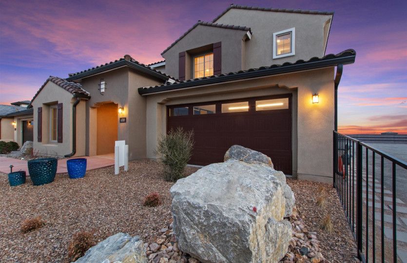 This home features 6 bedrooms, 4.5 baths, a den and a game room, and a 3-car tandem garage.