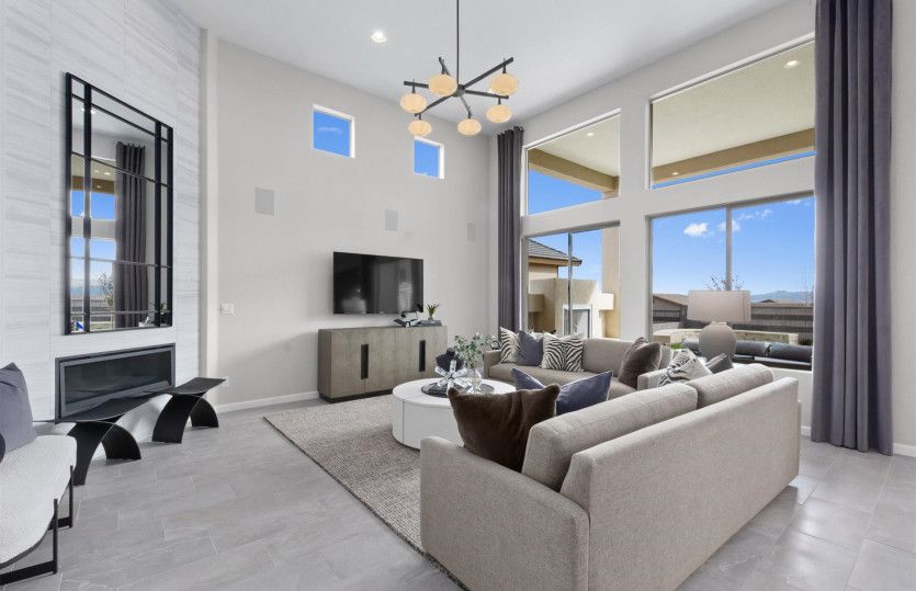 Two-story ceilings in the gathering room with bright, sunny windows.