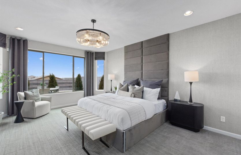 Roomy owner's suite with bright bay windows.