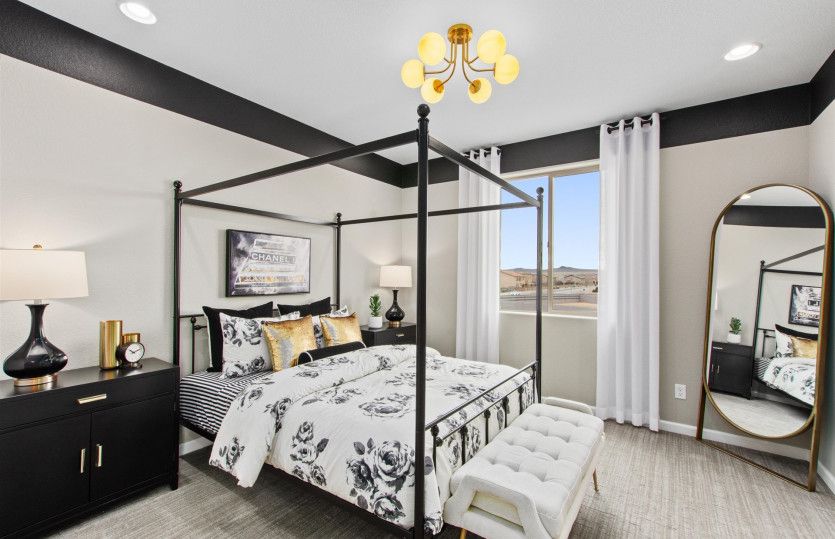 Large downstairs bedroom featuring its own walk-in closet and bath, perfect for visiting guests.