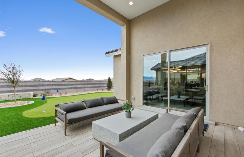The spacious covered patio is perfect for outdoor gatherings.