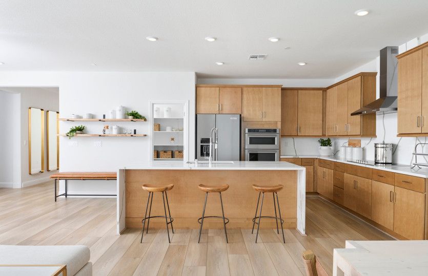 Luxurious kitchen with large waterfall edge island
