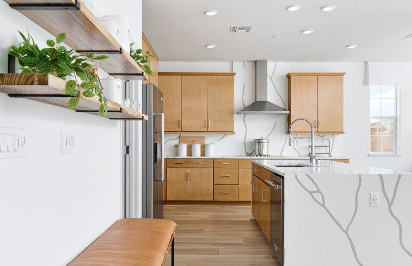 Sunlit kitchen with plenty of storage