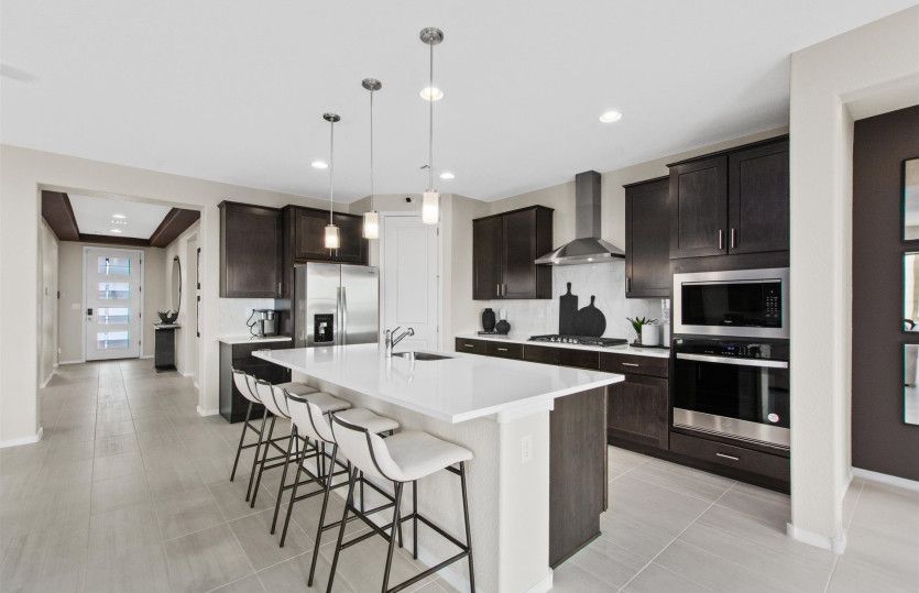Built-in stainless steel appliances including gas cooktop range takes cooking to the next level in y