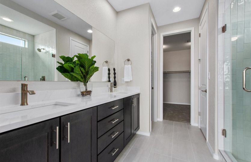 The owner's bath offers a double vanity, perferct for getting ready in the mornings.