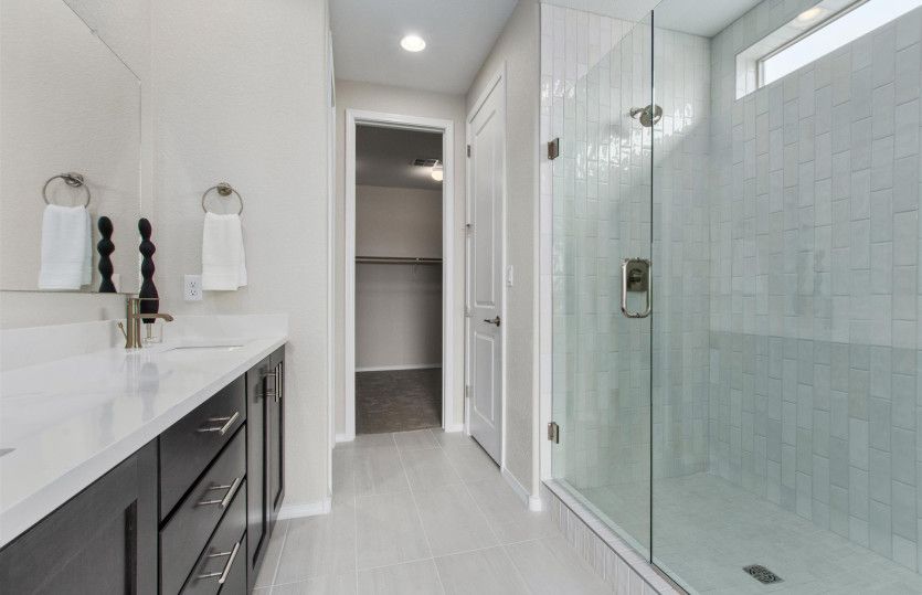 Enjoy a spacious walk-in shower and a walk-in closet.