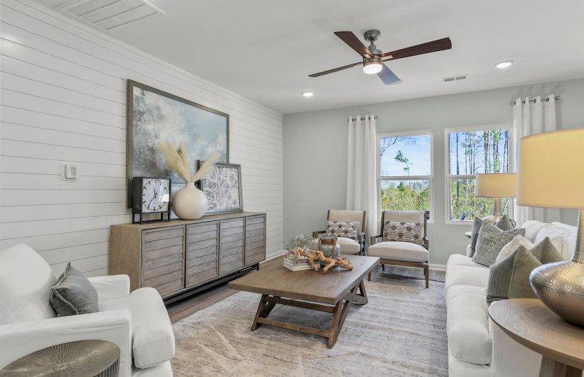 Sit by the fireplace in the gathering room.