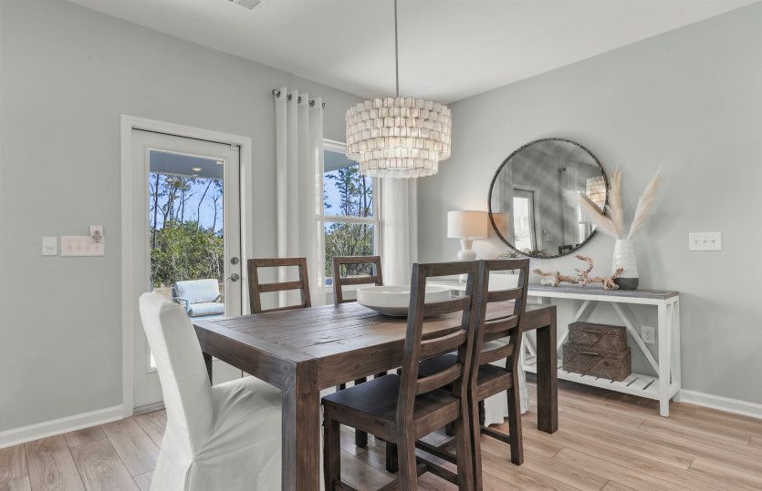 The breakfast café seamlessly transitions to the patio, offering an inviting space for alfresco dini