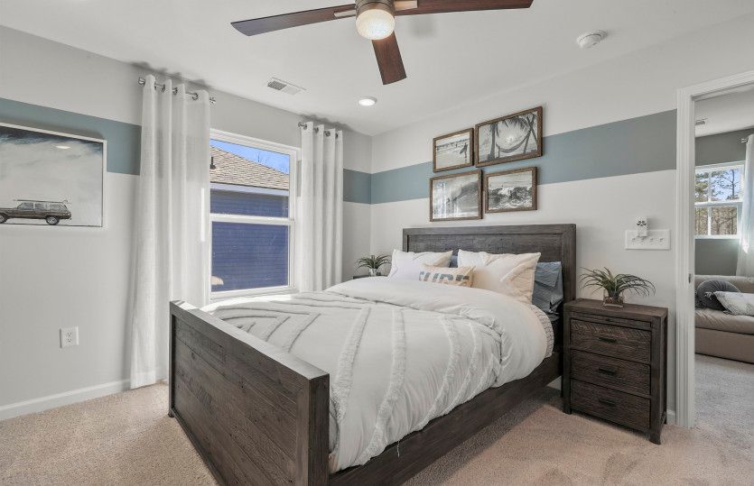 Guests will enjoy the secondary Bedroom with plush carpet.