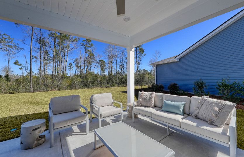 Bask in serene tranquility beneath the sheltered haven of the lanai.