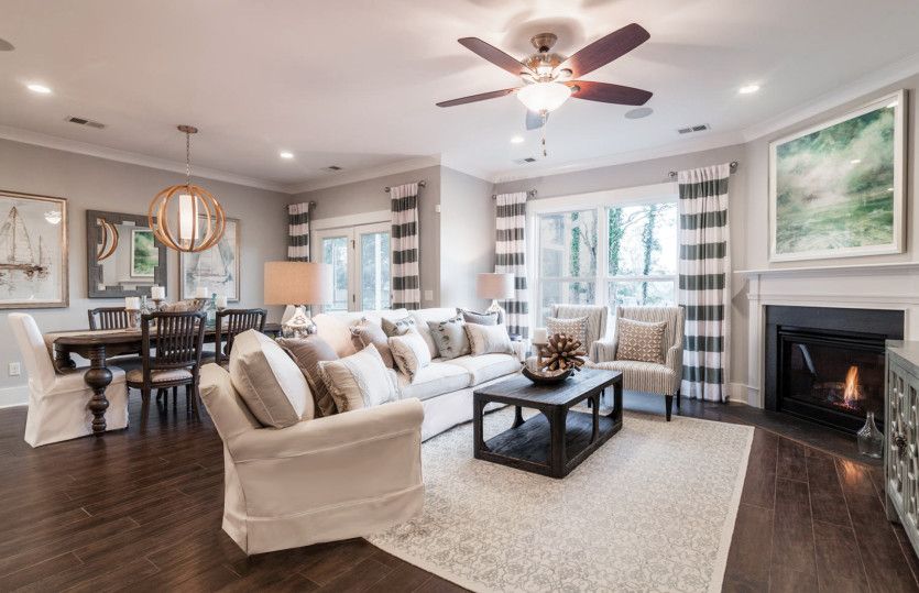Open Gathering Room with ample space for entertaining  seamlessly flows into the Café.