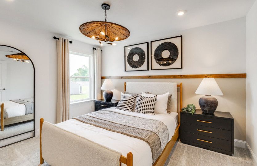Turn the secondary bedroom into a cozy haven, thoughtfully designed to offer comfort and tranquility