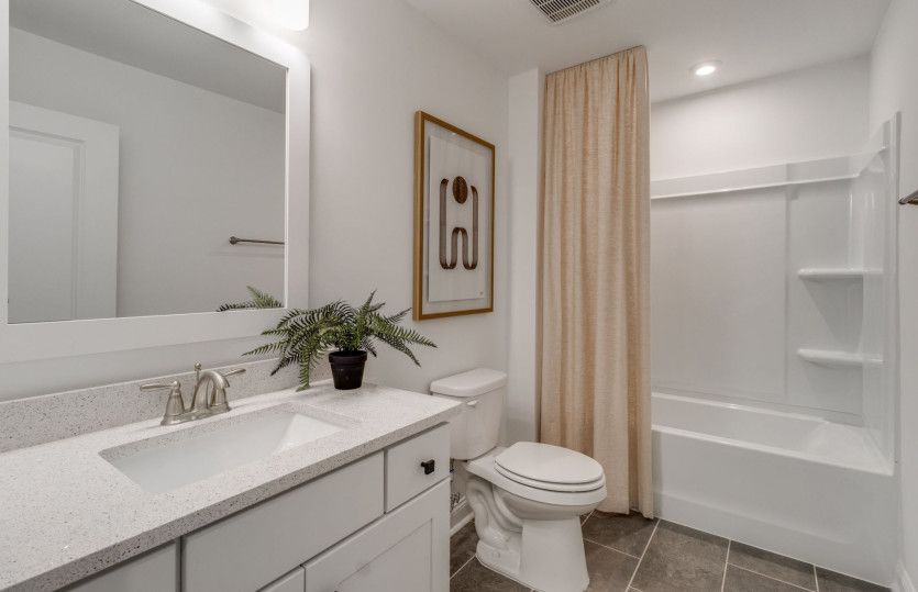 Spacious Secondary Bathroom with a soaking tub.