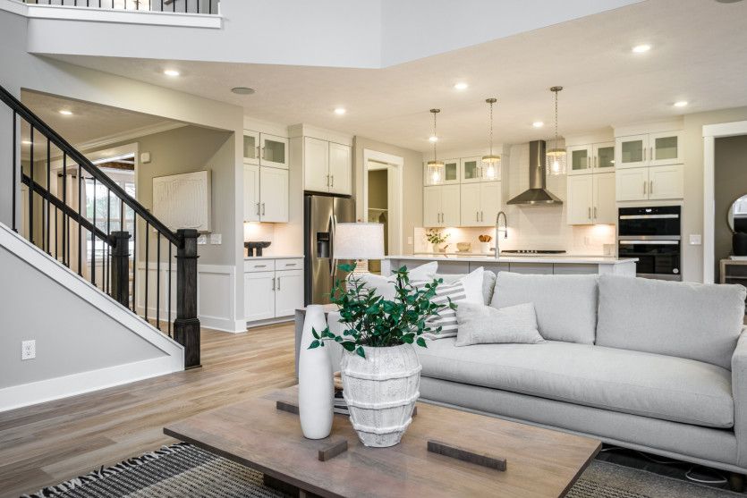 Open Concept Design Featuring Gathering Room, Kitchen and Café