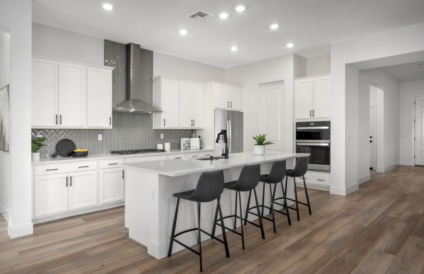 Spacious, island kitchen with eat-in bartop and abundant cabinet space