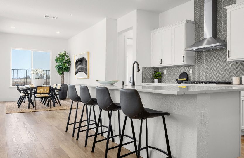 Kitchen open to café with lake views