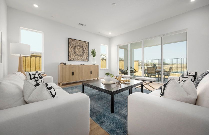 Gathering room with covered patio with lake views