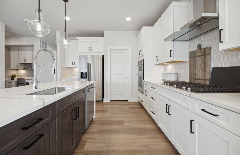 Gourmet Kitchen with Quartz Countertops and Stainless Steel Appliances