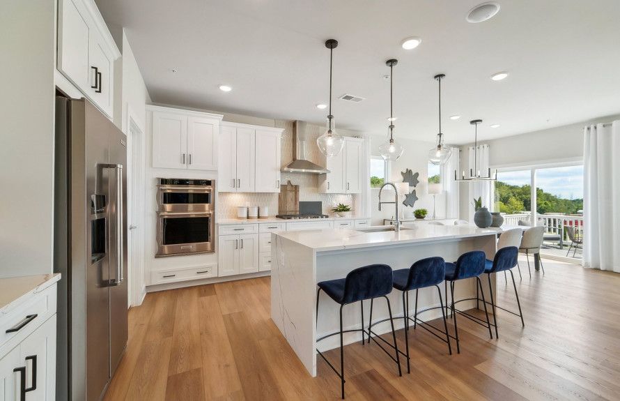 Gourmet Kitchen Overlooks Café and Deck
