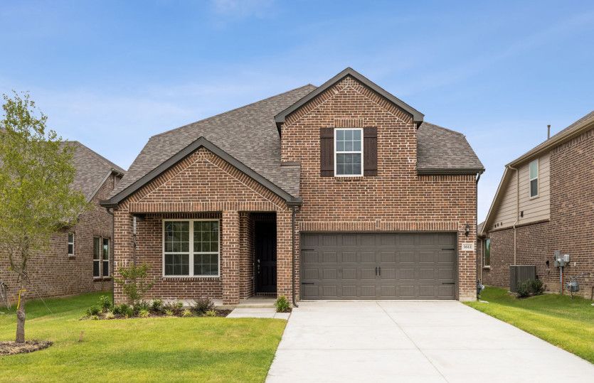 The Riverdale, a two-story home with 2-car garage, shown as Home Exterior A