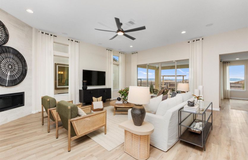 Gathering room modeled with extra seating perfect for lounging comfortably with the whole family.