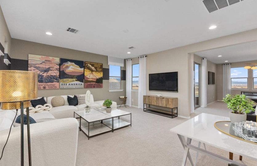 The loft upstairs acts as a separate living area to the guest suite for lounging and catching up on