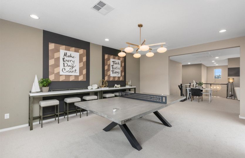 Upstairs game room creates the perfect playroom or flexible room to use how you see fit.