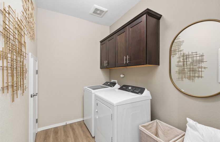 Laundry room with plenty of space and storage.