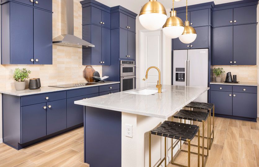 Additional storage space with stacked cabinets and a spacious kitchen island.