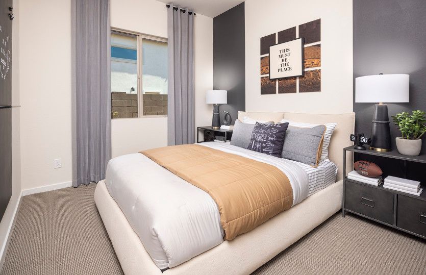 Spacious secondary bedroom in the Coventry II home design at Savio Ridge.