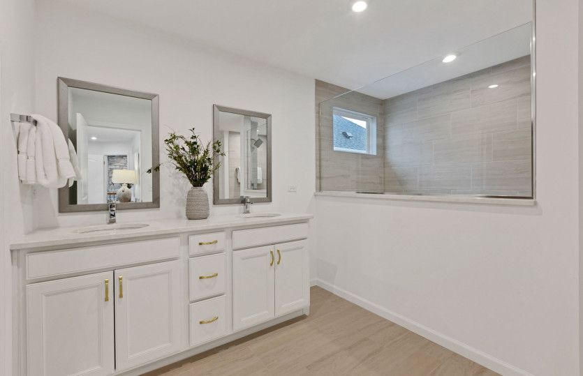 Spa-Like Owner's Bath with Dual Vanity and Walk-In Shower