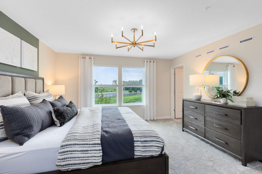 Spacious Owner's Suite, serene retreat.