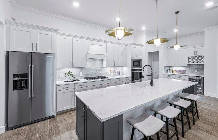 Open concept kitchen with stainless steel appliances