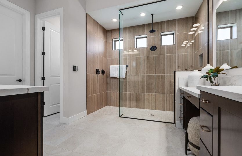 The Patagonia owner's bathroom features a beautifully tiled walk-in shower.