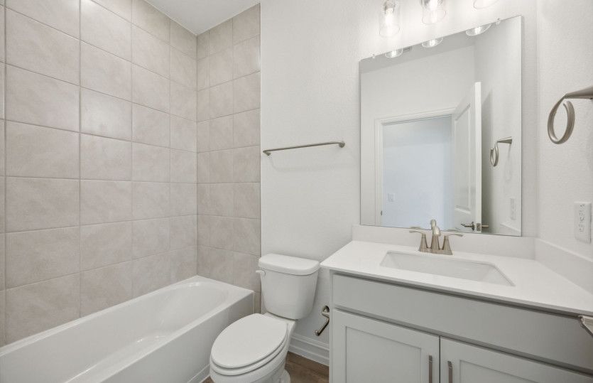 Spacious secondary bathroom *model representation