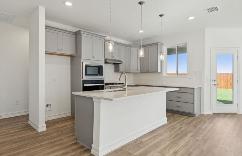 Airy kitchen with oversized island