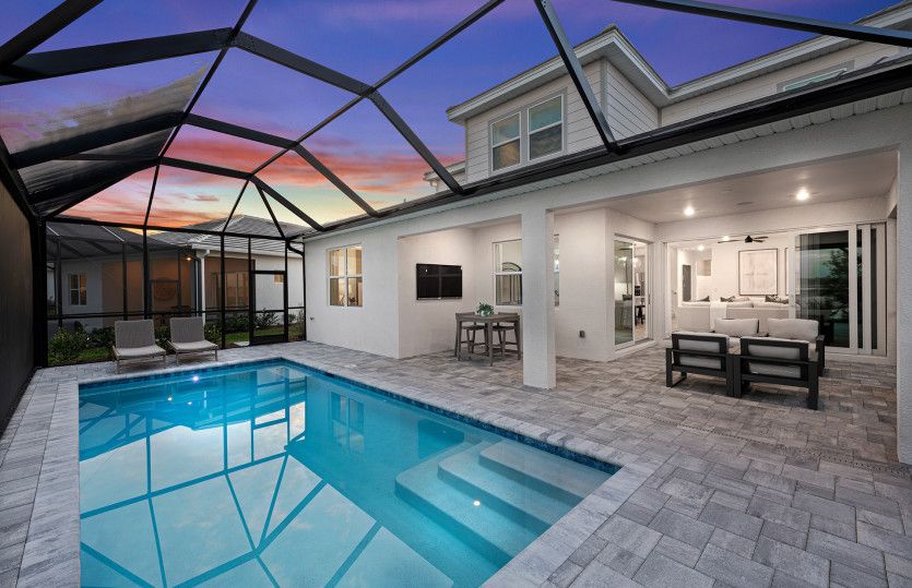 Screened-in pool with relaxing water views