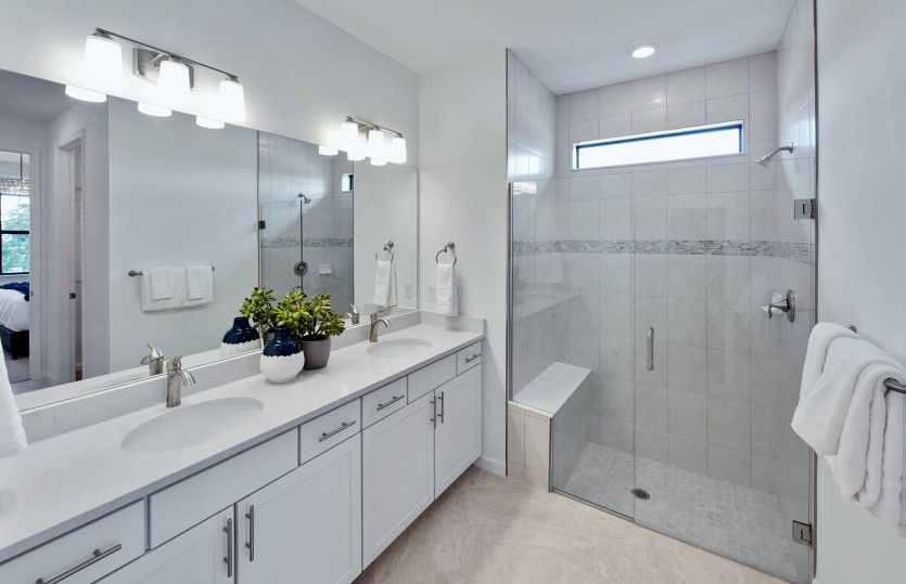 Owner's bathroom with dual sink vanity