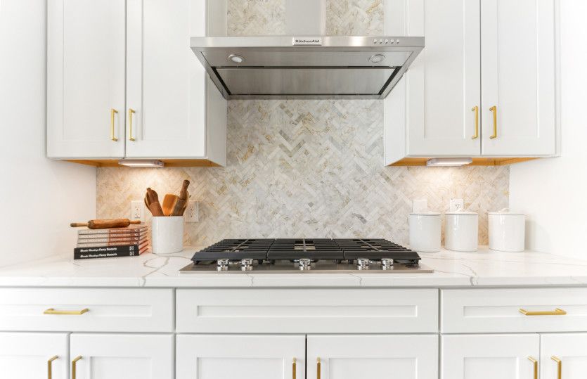 Gourmet Kitchen with Tile Backsplash