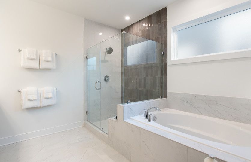 Luxurious Owner's Bath with Ceramic Tile