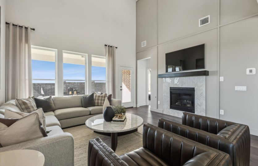 Spacious gathering room with natural light*model representation